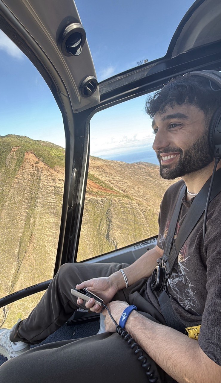 Akam Hamak in a helicopter